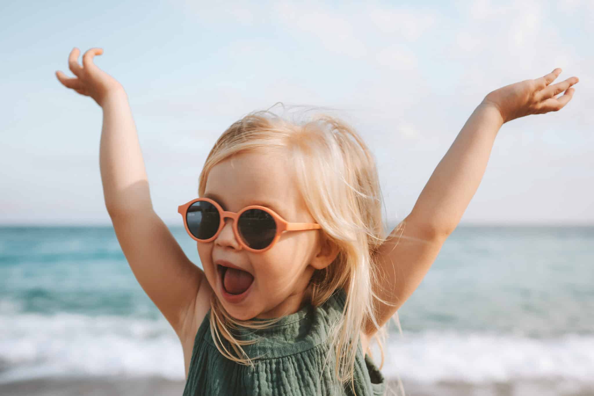 Funny Kid Girl Playing Outdoor Surprised Emotional Child In Sunglasses Years Old Baby Raised Hands Family Vacations